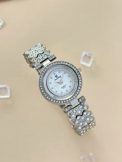 The Pave link watch gold tone